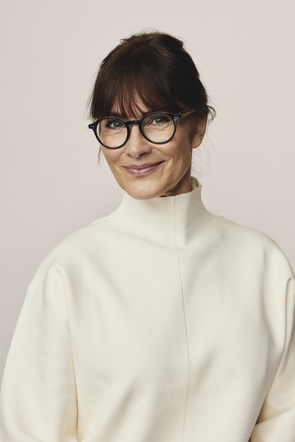framed glasses, woman portrait, cream sweater, high neck, soft textile