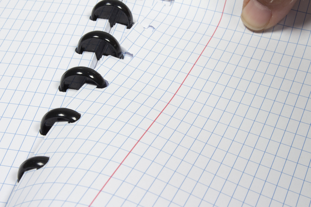 spiral notebook, ring binder, coil rings, notebook edge, grid paper
